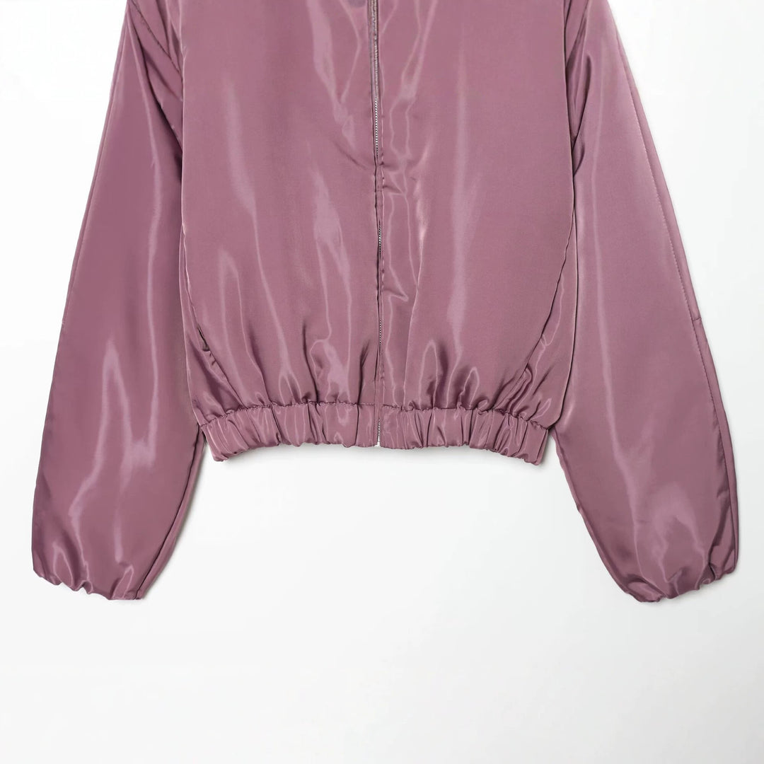 Damen Glänzende Cropped Bomberjacke mit Stehkragen und elastischem Bund Echo Archiv