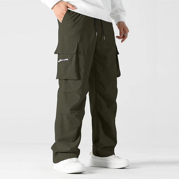 Herren weite Utility-Cargohose mit Tunnelzugbund, Knieabnähern und Multifachtaschen Echo Archiv