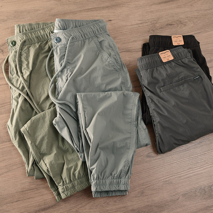 Herren lässige Jogginghose mit elastischem Bund und seitlichen Taschen Echoarchiv