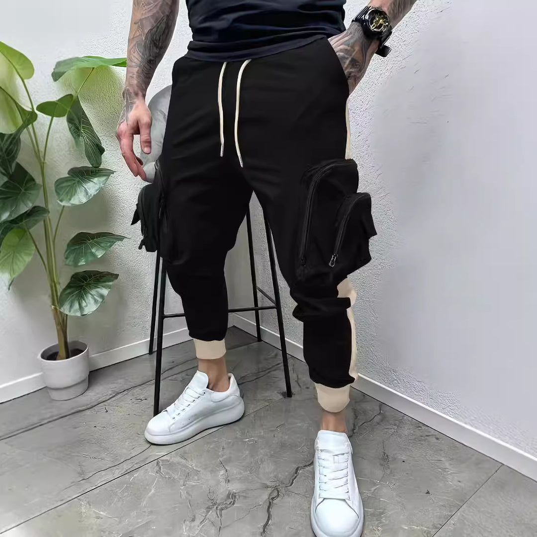 Herren Cargo-Hose mit mehreren Reißverschlusstaschen und elastischen Bündchen Echoarchiv