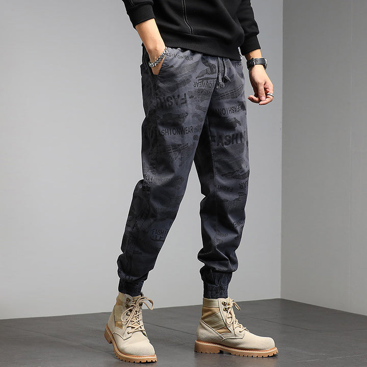 Herren Cargohose im Joggerstil mit Camouflage‑Print, Elastischem Tunnelzugbund und Klappentaschen Echo Archiv