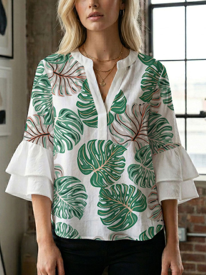 Damen Bluse mit voluminösen Flügelärmel und intensivem Blattmuster Echo Archiv