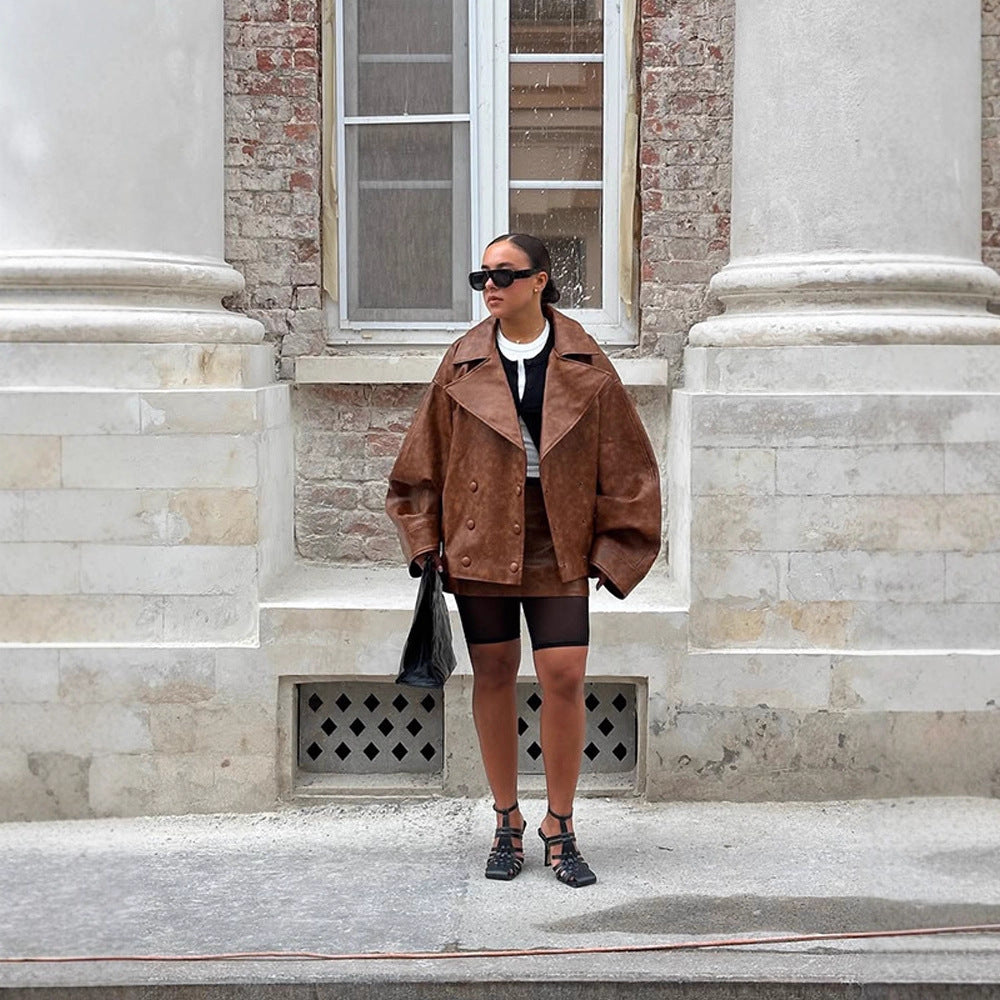 Damen Cropped-Boxy Lederimitat-Mantel mit übergroßem Revers und doppelreihiger Knopfleiste Echoarchiv