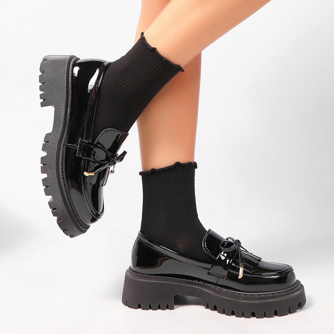 Damen  Lackoptik Loafer mit Quastenfransen Zierschleife und robuster Traktorsohle Echo Archiv