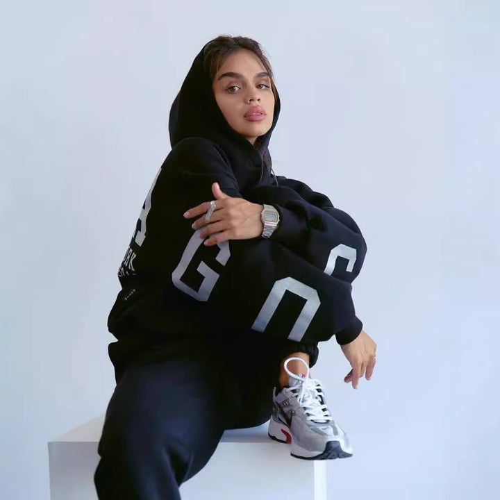 Damen Oversized Kapuzenpullover mit großflächigem Blockprint Echoarchiv