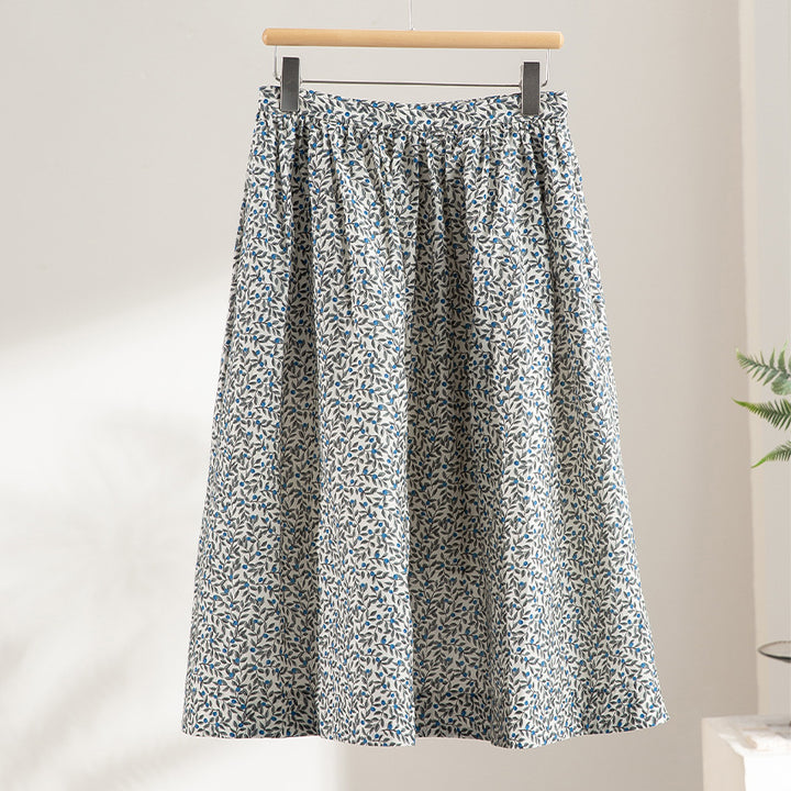 Damen Midirock mit Plissée‑Optik, gerafftem Bund und floralem Print Echoarchiv