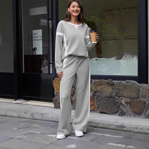 Damen sportives Lounge-Set mit weitem Sweatshirt, Palazzohose und seitlichen Kontraststreifen – Avérine