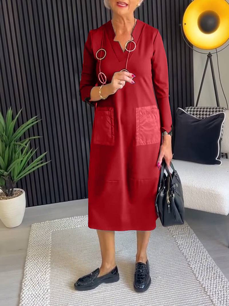 Damen nan knielanges, locker fallendes Kleid mit V-Ausschnitt Kontrasttaschen aus Satin und Dreiviertelärmeln Echo Archiv