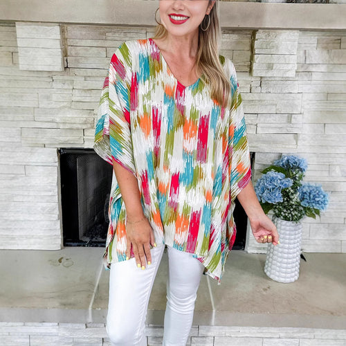 Damen Oversized V‑Neck Tunika im Plissee‑Look mit abstraktem Ikat‑Print – Avérine