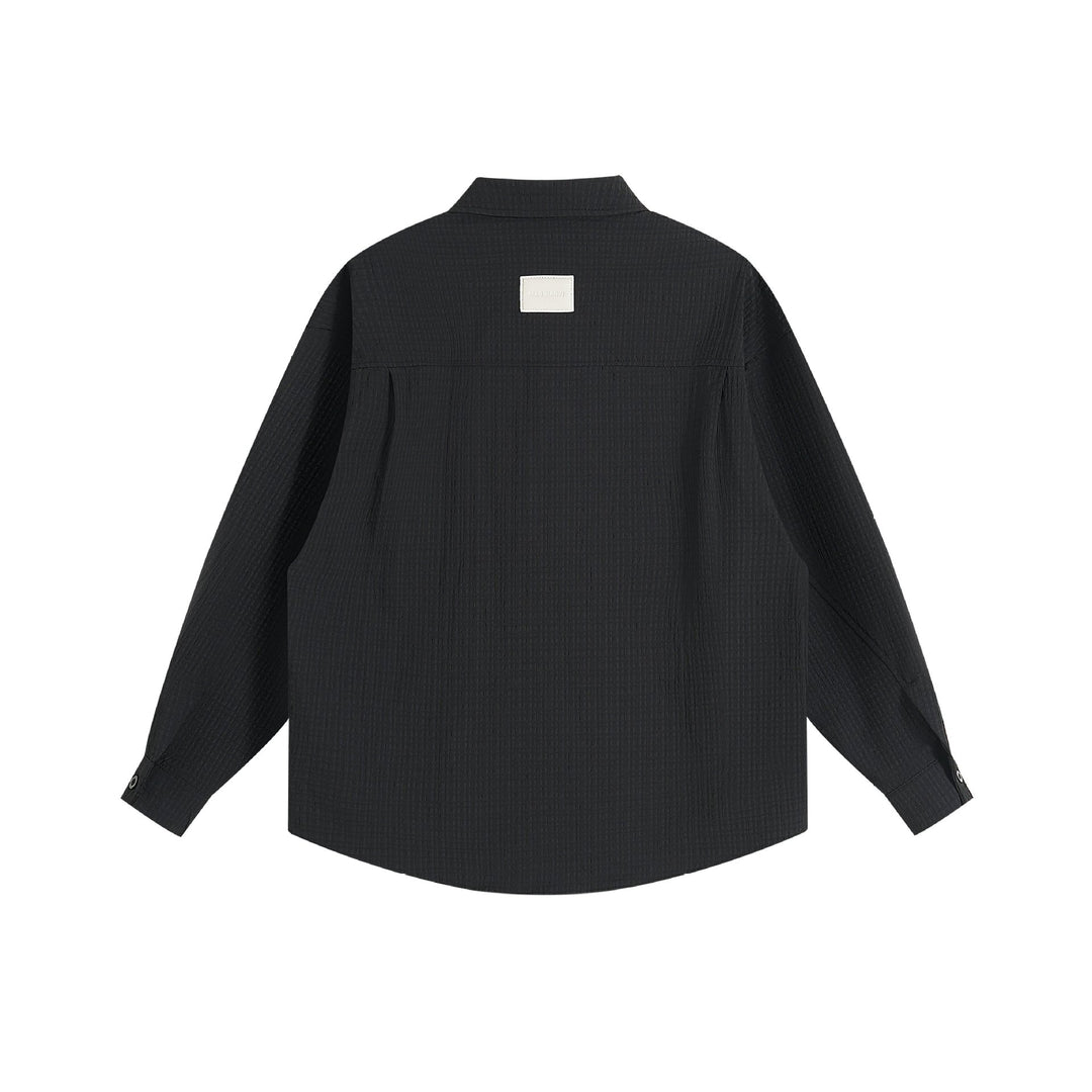Unisex Oversize Textur-Hemdjacke mit verdeckter Knopfleiste und Statement-Stickerei Echoarchiv