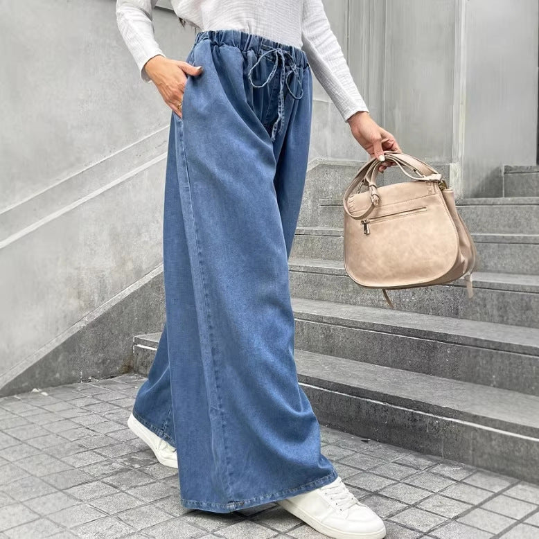 Damen Relaxte Palazzohose aus Denim mit Tunnelzugbund, Eingrifftaschen und extra weitem Bein Echo Archiv