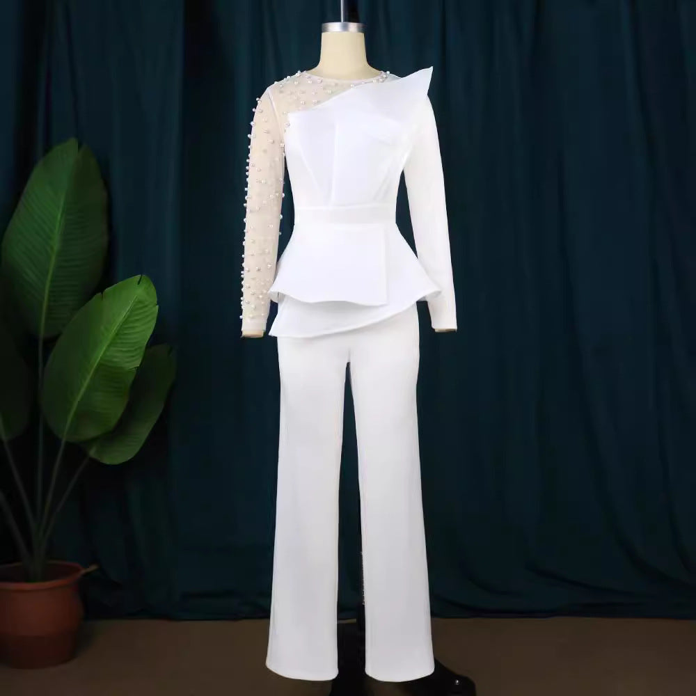 Damen Eleganter Jumpsuit mit transparenten Puffärmeln und tiefem V-Ausschnitt Echo Archiv
