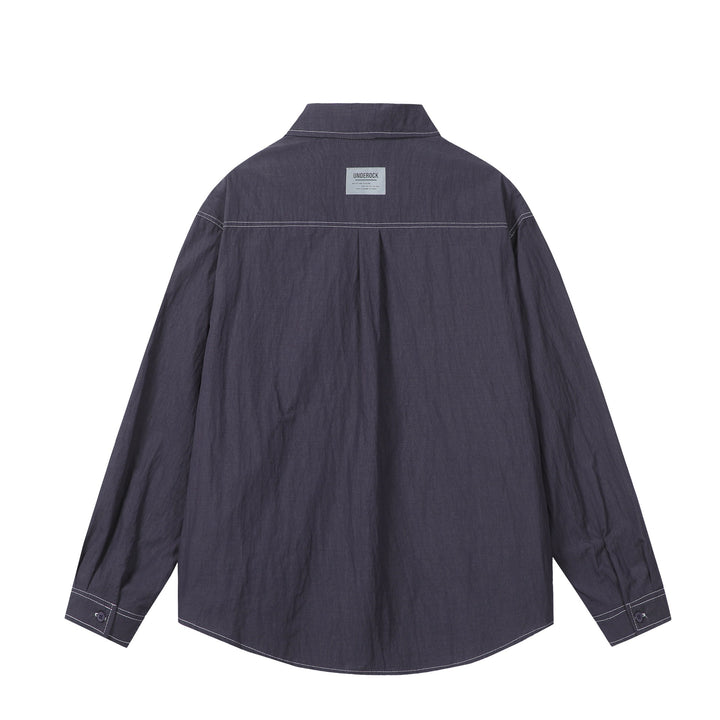 Unisex Oversize-Hemdjacke mit markanten Kontrastnähten und aufgesetzten Brusttaschen Echoarchiv