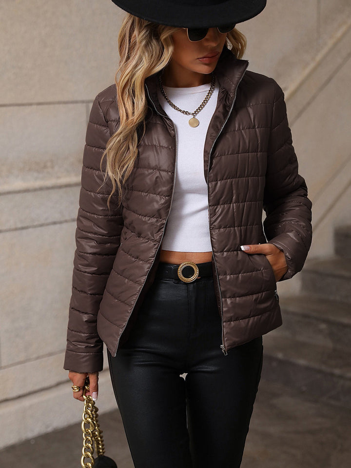 Damen gesteppte Übergangsjacke mit hochgeschlossenem Kragen und praktischen Taschen – Célinea
