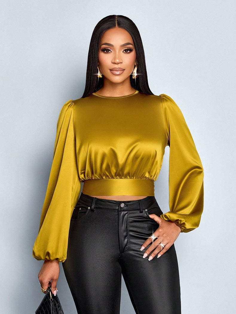 Damen Elegant geschnittene Leoparden-Bluse mit Dekolleté und Schleifenrand Echo Archiv