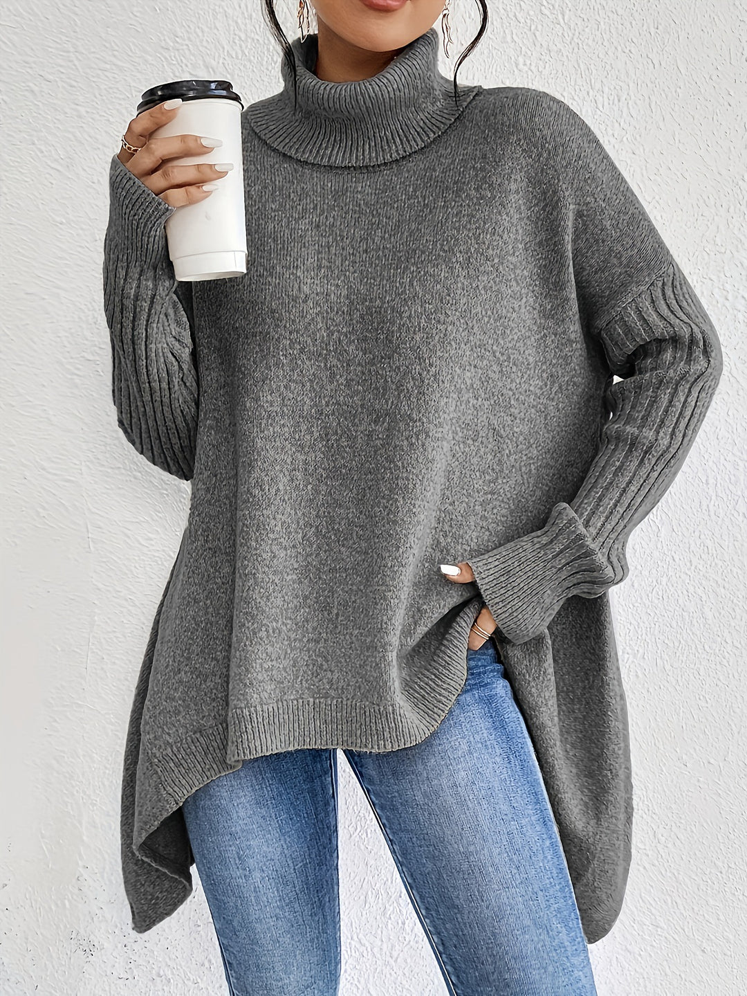 Damen nan Oversize Strickpullover mit hohem Rollkragen, gerippten Ärmeln und asymmetrischem Saum Echo Archiv