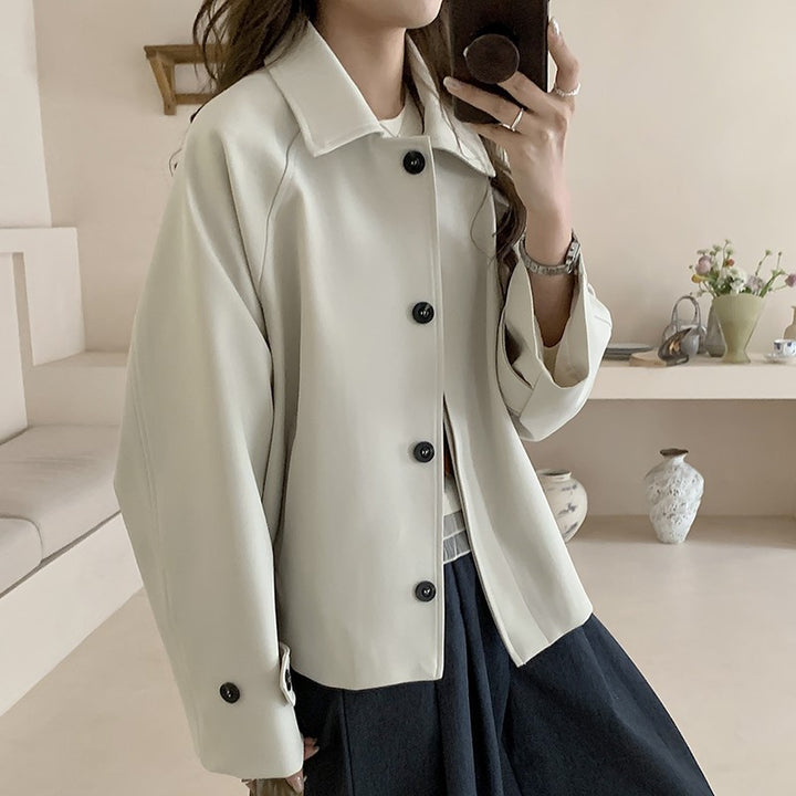 Damen Oversize Kurzjacke mit überschnittenen Schultern und großer Knopfleiste Echoarchiv