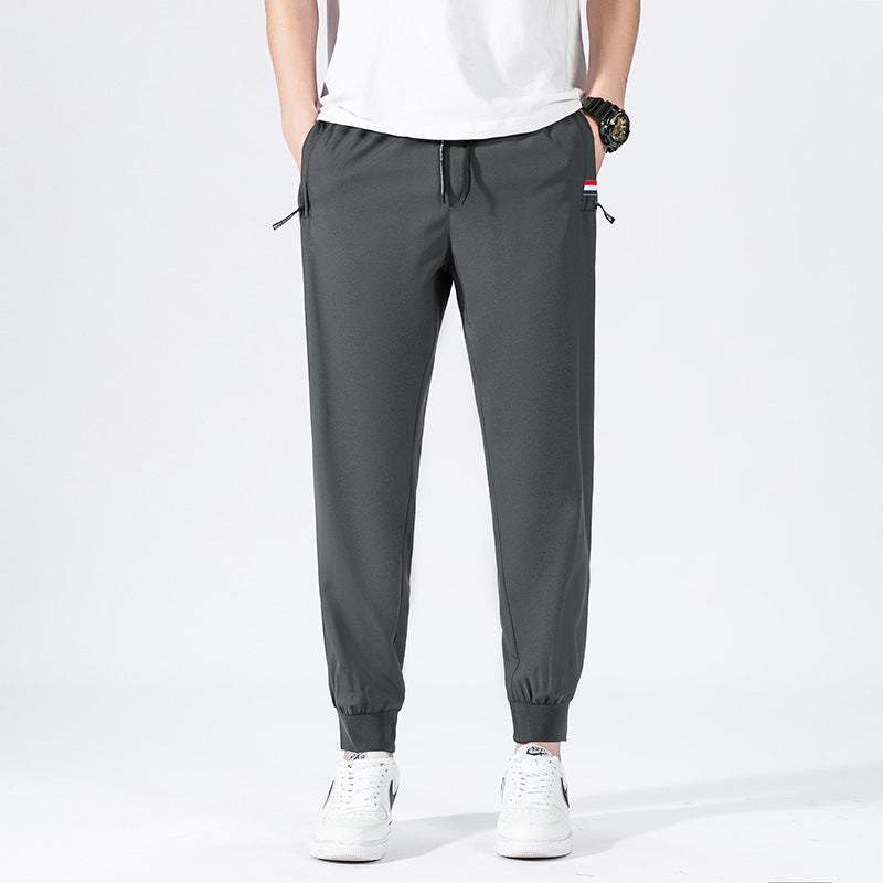 Herren Sportliche Jogginghose mit elastischem Bund und Seitentaschen Echo Archiv