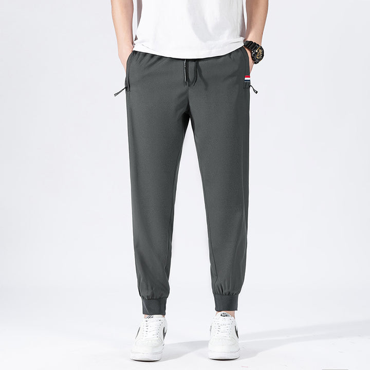 Herren Sportliche Jogginghose mit elastischem Bund und Seitentaschen Echo Archiv