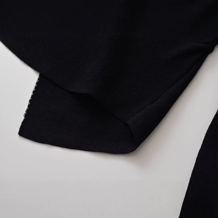 Damen Figurbetonte Rüschenbluse mit goldfarbenen Zierknöpfen und asymmetrischem Peplum Echoarchiv
