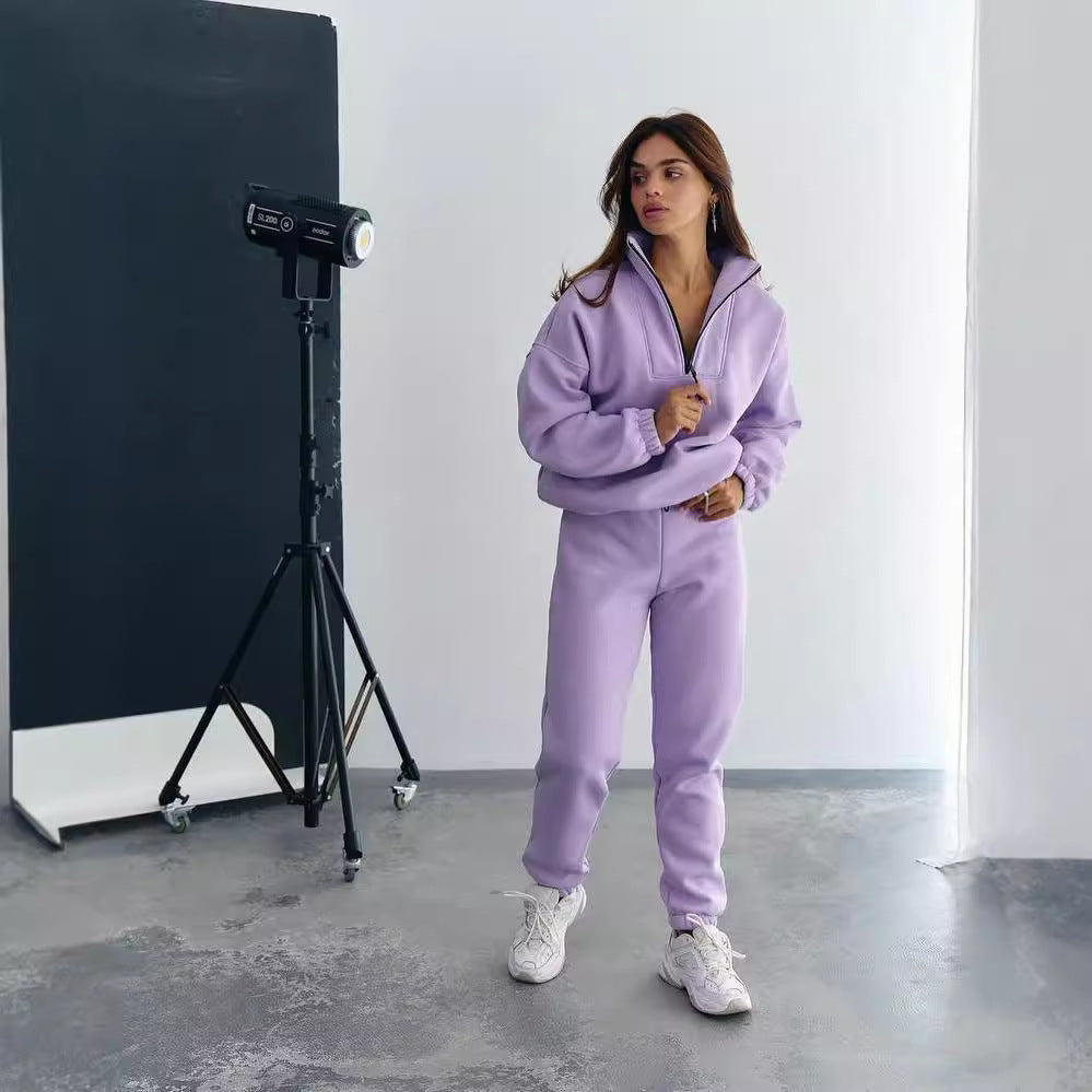 Damen Athleisure-Zweiteiler aus dickem French-Terry mit hohem Stehkragen, halbem Reißverschluss und Tunnelzughose Echoarchiv
