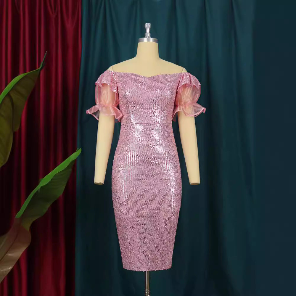 Damen glamouröses Abendkleid mit Glitzer und transparenten Puffärmeln Echo Archiv