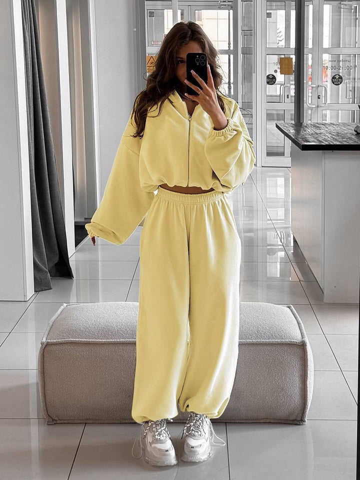 Damen nan oversized Kapuzenjacke mit durchgehendem Reißverschluss und Highwaist Gummibund-Jogginghose Set Echo Archiv