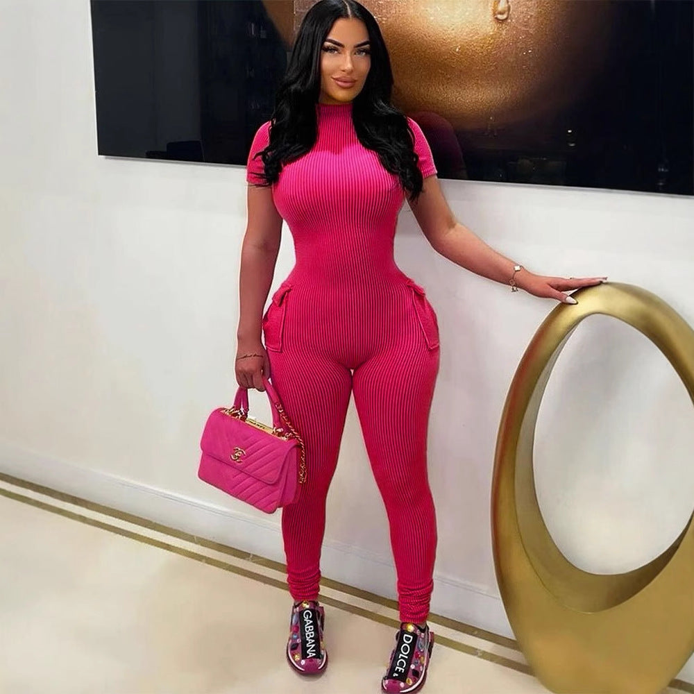 Damen figurbetontes Jumpsuit mit hohem Kragen und Seitentaschen Echo Archiv