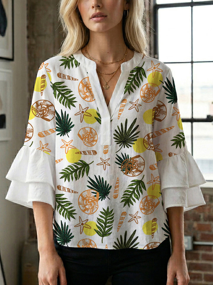 Damen Bluse mit voluminösen Rüschenärmeln und modernem Motiv Echo Archiv
