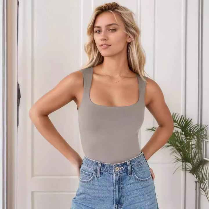 Damen Sportlicher Body mit Kreuzrücken Echo Archiv