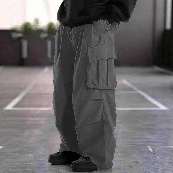 Herren Oversize-Baggy-Cargohose im Urban-Utility-Stil mit elastischem Tunnelzugbund und Mehrfachklappentaschen Echo Archiv