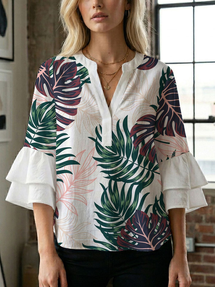 Damen Blusenshirt mit voluminösen Ärmeln und kreativem Druckdesign Echo Archiv