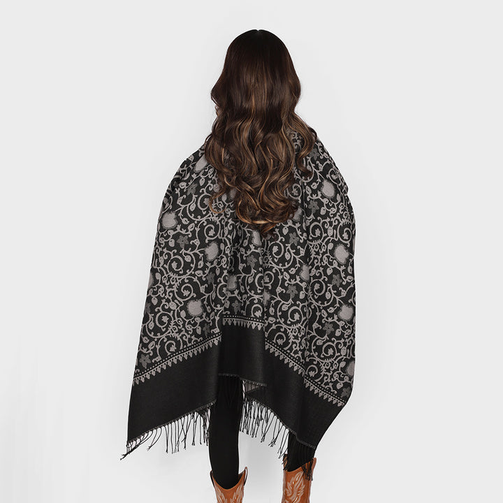 Damen Jacquard-Ruana mit ornamentalem Bordürenmuster und Fransensaum – Avérine