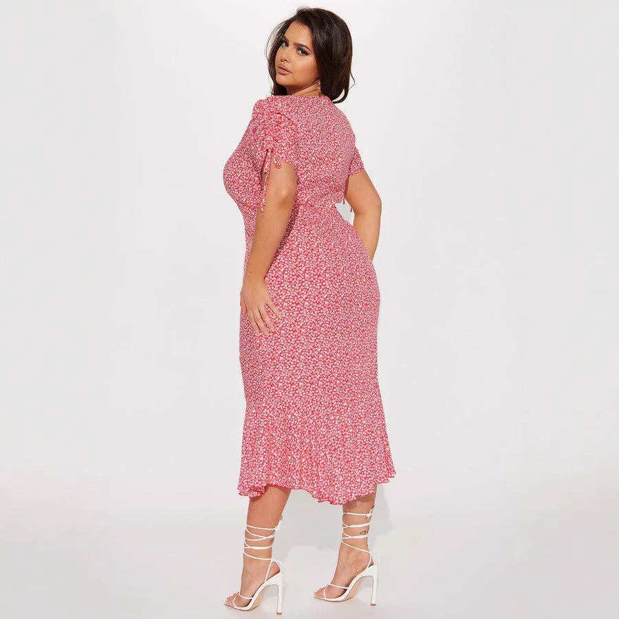 Damen Midi-Kleid mit floralen Mustern und luftigen Rüschendetails Echo Archiv