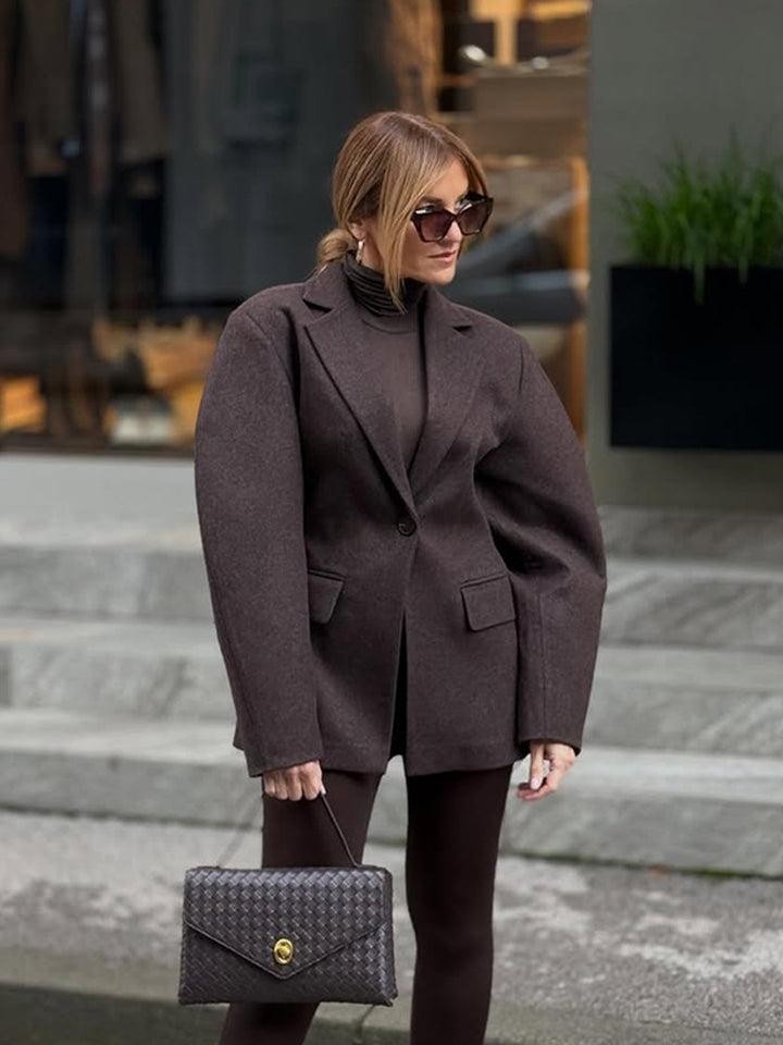 Damen Oversize-Strukturblazer mit betonter Schulterpartie und voluminösen Ärmeln Echoarchiv