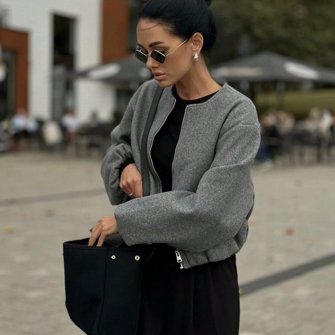 Damen modische kurz geschnittene Jacke mit voluminösen Ärmeln Echoarchiv