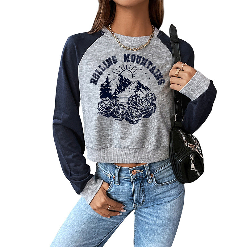 Damen Cropped Raglan-Sweatshirt mit Bergmotiv, Rippbündchen und lockerer Passform Echoarchiv