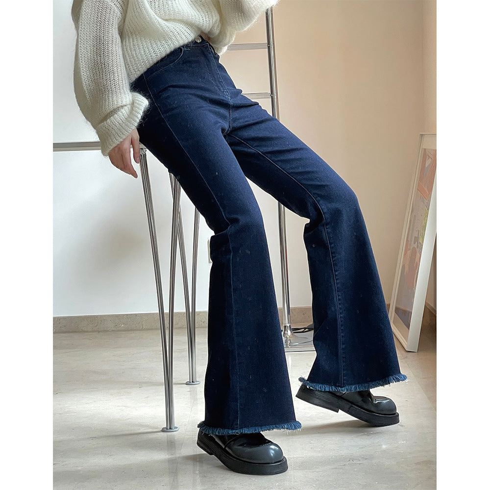 Damen High‑Waist Schlagjeans mit leichtem Bootcut und fransigem Saum Echoarchiv