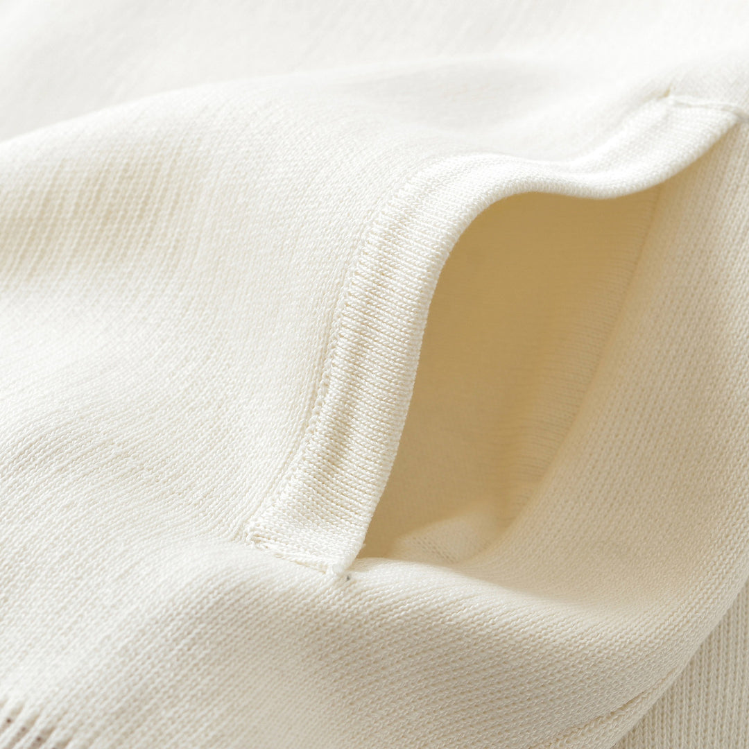 Damen Boxy-Strickjacke mit Knopfverschluss und Rippbündchen Echoarchiv