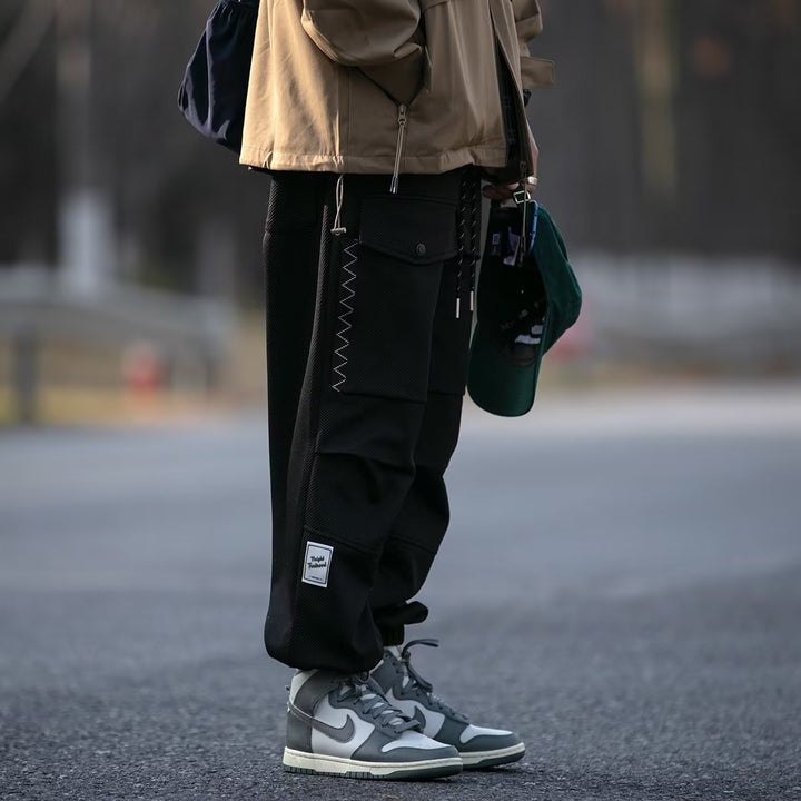 Herren weite Cargo-Jogginghose mit Kordelzug Klapptaschen und elastischen Bündchen Echoarchiv