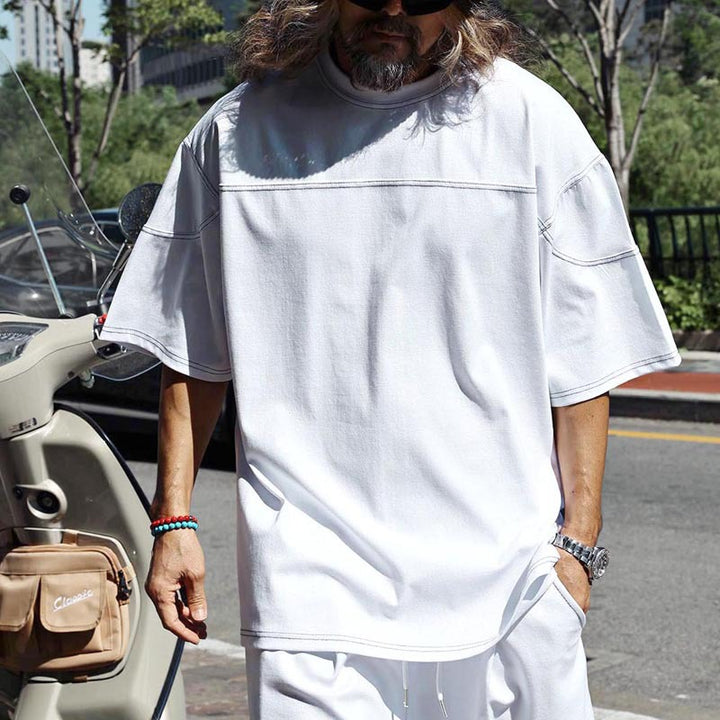 Herren lässiges Kurzarm-T-Shirt mit oversized Schnitt und komfortablen Hosen Echoarchiv