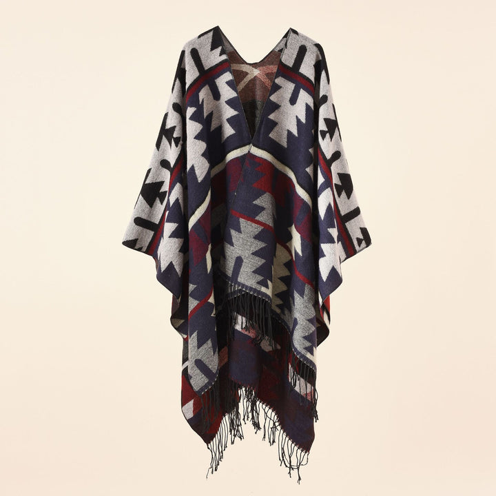 Damen Oversize-Ruana mit V‑Ausschnitt, grobem Jacquardmuster und langen Fransen Echo Archiv