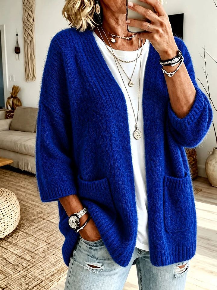 Damen Offener Longcardigan im Mohair-Look mit aufgesetzten Taschen und überschnittener Schulter – Veloura