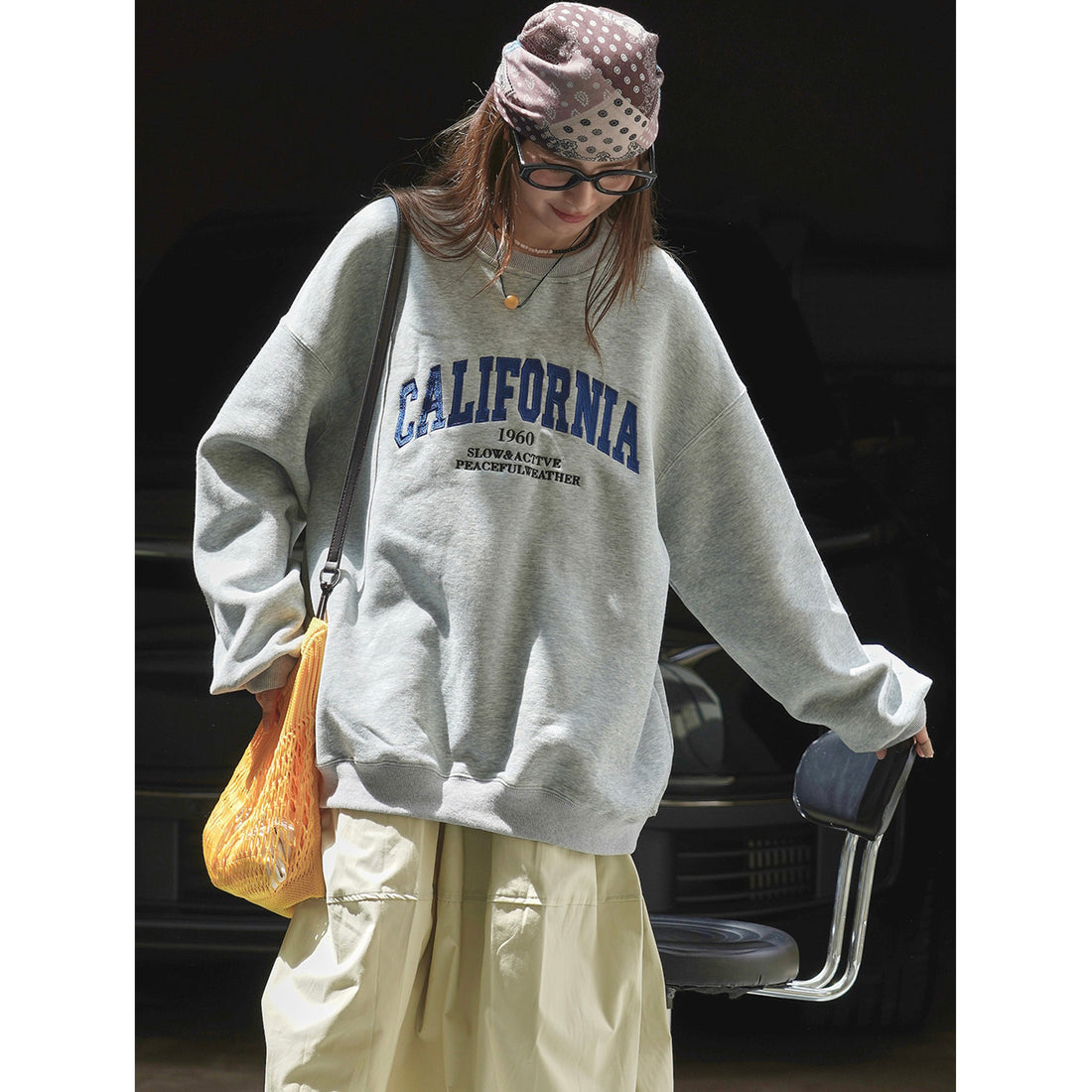Damen Weites College‑Sweatshirt mit Rundhalsausschnitt und Statement-Print Echoarchiv