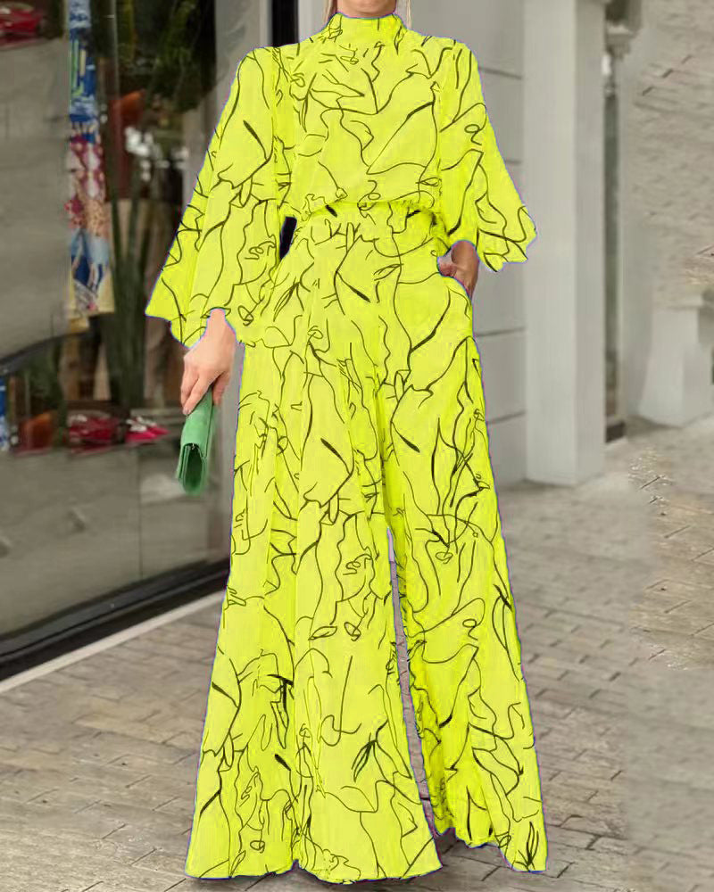 Damen Eleganter Longline Jumpsuit mit Stehkragen, Ballonärmeln und Seitentaschen Echoarchiv