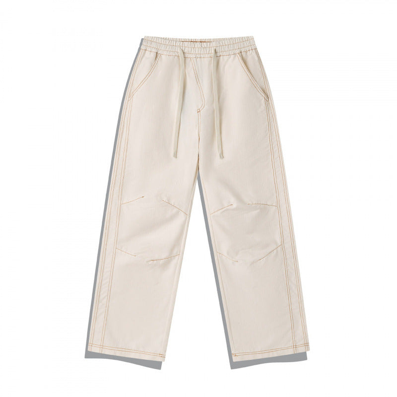 Unisex Weite Denim-Hose mit elastischem Bund, Kordelzug und gesteppter Kniepasse Echo Archiv