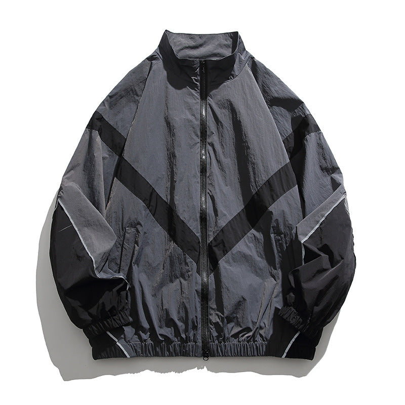 [Unisex] Oversize technische Wind- und Regenjacke mit Stehkragen, reflektierenden Paspeln und elastischem Saum Echo Archiv