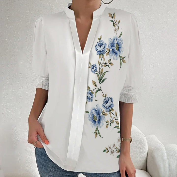 Damen Blumenprint Tunika-Bluse mit Stehkragen, geschlitzter V‑Blende und gerafften 3/4-Ärmeln – Élovi