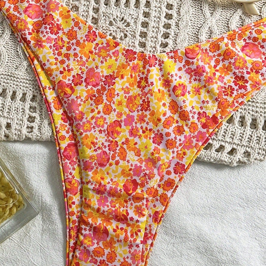 Damen Triangel-Bikini mit fließendem Floral-Design Echo Archiv