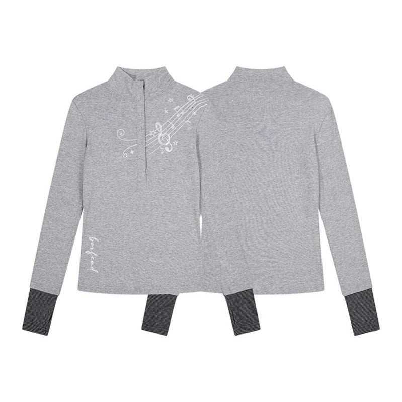 Damen Langarmshirt mit Henley-Knopfleiste, Kontrastbündchen und Notenprint Echoarchiv